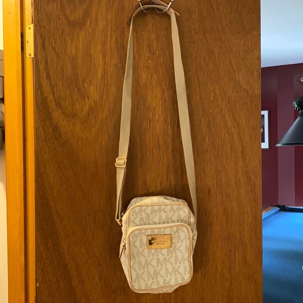 Michael Kors travel crossbody bag in white